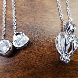 Silver necklaces with clear rhinestones and a pearl